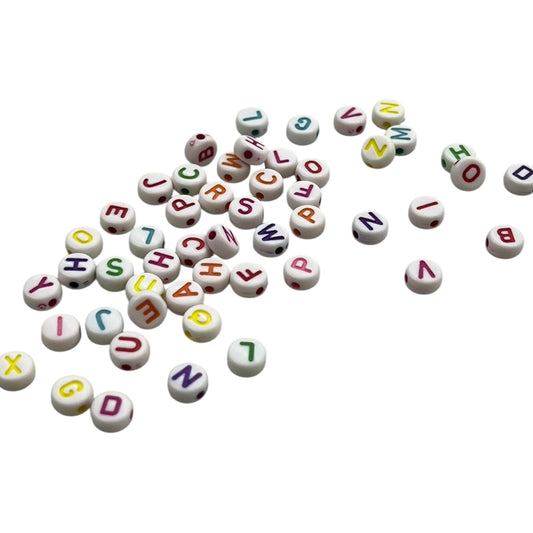 Pepas o letras para bisutería de colores x 20g