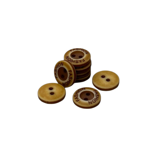 Botón camisero 2 huecos #20 x 50 Und